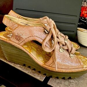 Fly London Ylfa Metallic gold Luna lace up wedge sandal. New without tags.